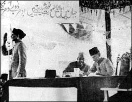 Chaudhari Khaliquzzaman (left) seconding the 1940 Lahore Resolution of the Muslim League with Jinnah (right) presiding, and Liaquat Ali Khan (centre)