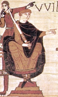En sittende mann i kappe som holder et sverd rettet oppover i den ene hånden og peker med den andre hånden. Bak den sittende figuren er stående mann som peker i samme retning som den sittende.