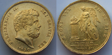 Photos recto et verso d'une pièce de monnaie en or