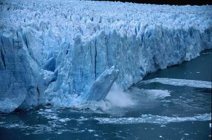 Piece of the wall falling at Perito Moreno Glacier