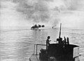 Image 90HMAS Australia and Arunta bombarding Cape Gloucester (from Military history of Australia during World War II)