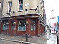 A wider image of the pub named after John Snow with the pump centre-right