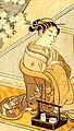 Image 1An oiran preparing herself for a client, ukiyo-e print by Suzuki Haronubu (1765) (from Prostitution)