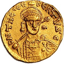 A coin depicting a man's highly-stylised, crowned head