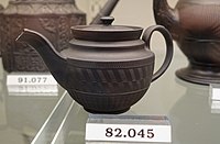 Teapot attributed to Davenport, c. 1820, black basalt stoneware
