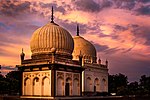 Two Islamic tombs at sunset