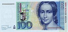 은은한 푸른색 바탕에 녹색과 베이지색이 어우러진 지폐로, 오른쪽에 있는 젊은 여성의 얼굴에 초점이 맞춰져 있으며, 연한 푸른색 위에 짙은 푸른색 드로잉이 그려져 있다.