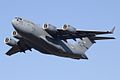 A C-17A Globemaster III taking off from Ramstein Air Base