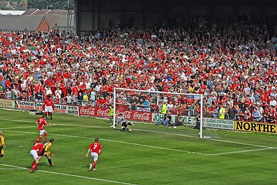 Ryan Valentine scores a penalty for Wrexham to keep them in the Football League
