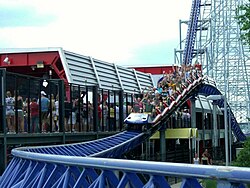 Roller coaster train on a small hill