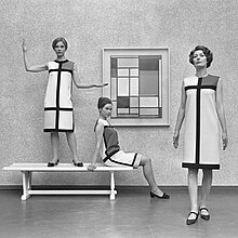 Mondrian dresses by Yves Saint Laurent shown with a Mondrian painting in 1966