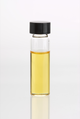 Lemongrass (Cymbopogon flexuosus) essential oil in clear glass vial