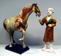 Tang dynasty tomb figure in sancai glaze pottery, horse and groom (618-907)