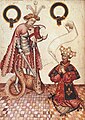 An illuminated manuscript from around 1430 showing William Bruges, the first Garter King of Arms, kneeling before St George. He was appointed in 1415 or 1417.
