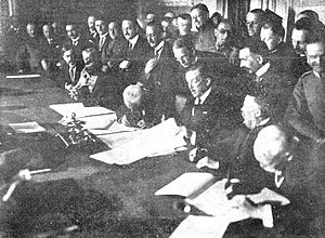 Foreign Minister of Austria-Hungary, Stephan Burián von Rajecz, signing the treaty