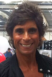 A head-and-shoulders photo of a smiling Fatima Whitbread