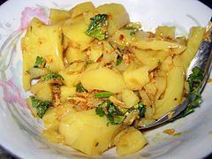 To hpu thouk - yellow tofu salad is a national favourite.