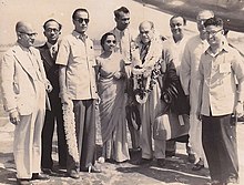 Diptendu Pramanick with Frank Capra, latter deluged with garlands at the Dum Dum airport, Calcutta in 1952