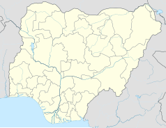 Mapa konturowa Nigerii, blisko dolnej krawiędzi nieco na lewo znajduje się punkt z opisem „Yenagoa”