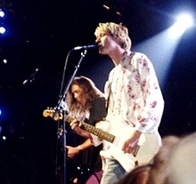 A sideview of Cobain and Novoselic onstage