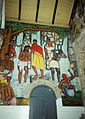 A mural depicting the baptism of Jesus in a typical Haitian rural scenery, Cathédrale de Sainte Trinité, Port-au-Prince, Haiti.