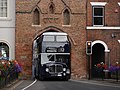 Image 55The sharply-arched Beverley Bar necessitated a special bus design. A preserved East Yorkshire Motor Services AEC Bridgemaster with an arched roof passes under the Bar in August 2022. (from Lowbridge double-deck bus)