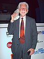 Image 54Martin Cooper of Motorola, shown here in a 2007 reenactment, made the first publicized handheld mobile phone call on a prototype DynaTAC model on 3 April 1973. (from Mobile phone)