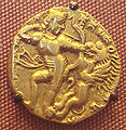 Gold coin of Gupta era, depicting a Gupta king holding a bow, 300 CE.