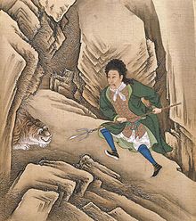 Painting of Chinese man, in Western clothes, attacking a tiger with a pitchfork-like staff