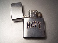 An open full-size Navy Zippo