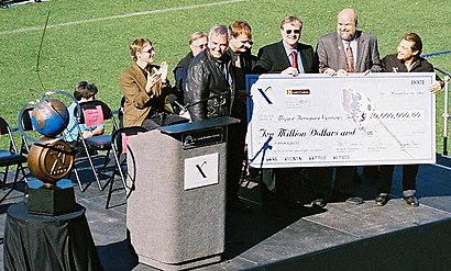 Representatives of the X Prize Foundation symbolically presented the ten million dollar prize to Burt Rutan and Paul Allen of Mojave Aerospace Ventures on November 6, 2004. The Ansari X Prize trophy is on the left.