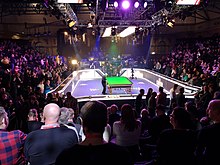 image of snooker table and crowd