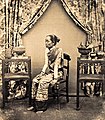 Princess Thip Keson (or Thep Kraison), Princess of Chiang Mai, consort of Inthawichayanon of Chiang Mai and mother of Dara Rasmi wearing sinh and pha biang, before 1884