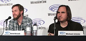 Aaron Horvath and Michael Jelenic speaking during a WonderCon panel for "Teen Titans Go!" in 2016
