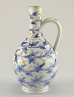 Vase, 1869–72, salt-glazed Lambeth stoneware with incised and relief decoration.