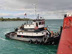 Tugboat Nancy Anne assisting a tug and barge docking in Rogers City, Michigan