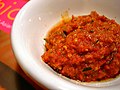 Image 50Sambal belacan, made with mixed toasted belachan, ground chilli, kaffir leaves, sugar and water (from Malaysian cuisine)