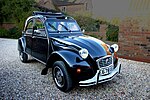 Citroën 2CV fixed profile convertible circa 1975, with roll-back roof and rigid doors