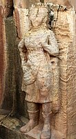 Warrior wearing Achkan or long coat or chiton, and boots from Udayagiri and Khandagiri Caves, Orissa, 2nd century BCE.[10]