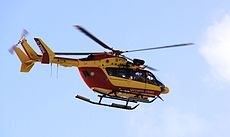 Un hélicoptère Eurocopter EC-145, utilisé par la Sécurité Civile française, survolant le port de plaisance de Minimes à La Rochelle au début de l'après-midi du dimanche 28 février 2010 après le passage dans la nuit de la tempête baptisée "Xynthia". Immatriculation de cet appareil: F-ZBPK. La Rochelle (Port de Plaisance des Minimes), Charente Maritime, France.