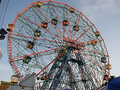 Wonder Wheel, a 45.7-metre (150 ft) tall eccentric wheel at Deno's Wonder Wheel Amusement Park, Coney Island, was built in 1920 by the Eccentric Ferris Wheel Company[176]