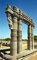 Kakatiya Kala Thoranam (Warangal Gate) built by the Kakatiya dynasty in ruins; one of the many temple complexes destroyed by the Delhi Sultanate.[32]