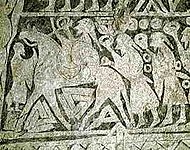 A Pedra Tängelgårda mostra um figura liderando uma tropa de guerreiros. Símbolos Valknut são desenhados embaixo de seu cavalo.