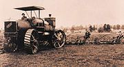 Early example of four-wheel steering. 1910 photograph of 80 hp Caldwell Vale tractor in action.