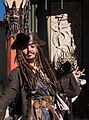 Image 28A person costumed in the character of captain Jack Sparrow, Johnny Depp's lead role in the Pirates of the Caribbean film series (from Piracy)