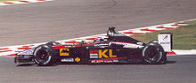 Webber driving his Minardi PS02 car at the 2002 French Grand Prix in Magny Cours