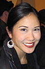 A smiling Deedee Magno in a black jacket.