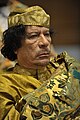 Image 2 Muammar Gaddafi Photograph: Jesse B. Awalt/US Navy Muammar Gaddafi (c. 1942 – 2011) was a Libyan revolutionary and politician. Taking power in a coup d'etat, he ruled as Revolutionary Chairman of the Libyan Arab Republic from 1969 to 1977 and then as the "Brotherly Leader" of the Great Socialist People's Libyan Arab Jamahiriya from 1977 to 2011, when he was ousted in the Libyan Civil War. Initially developing his own variant of Arab nationalism and Arab socialism known as the Third International Theory, he later embraced Pan-Africanism and served as Chairperson of the African Union from 2009 to 2010. More selected portraits