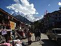Market in Main street of Reckong Peo, with Kinnaur Kailash in background.