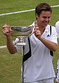 Image 17Todd Woodbridge holding the Gentlemen's doubles silver challenge cup in 2004 (from Wimbledon Championships)